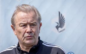 The Minnesota United Head Coach Adrian Heath takes to the field after a brief practice.