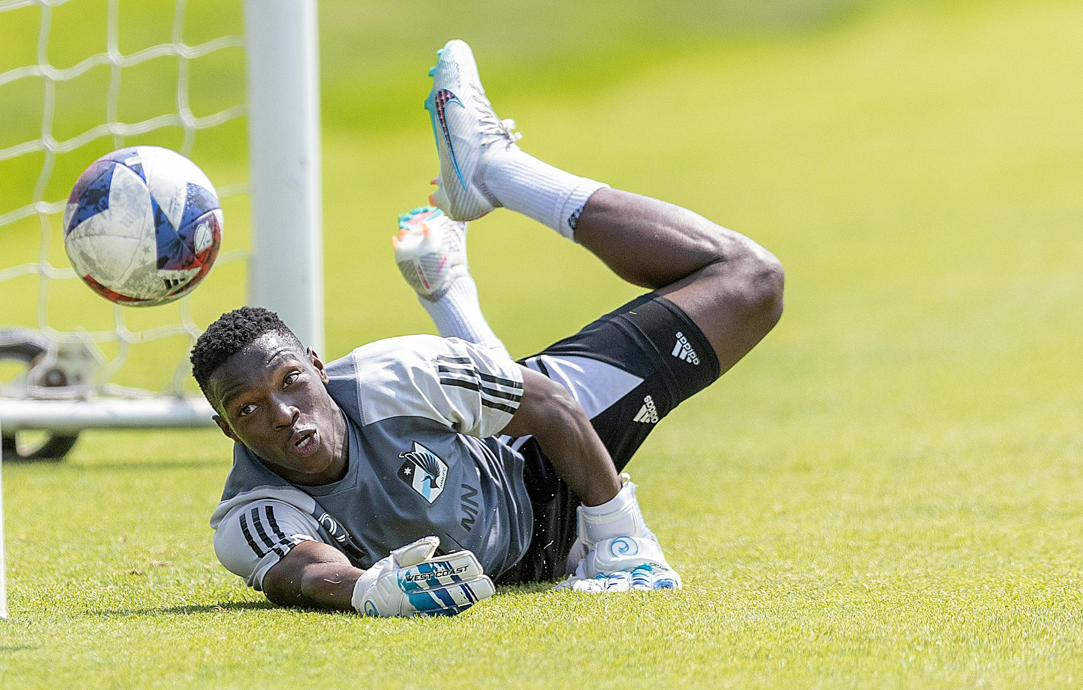 Minnesota United forward Bongokuhle Hlongwane shows off his goalie skills after practice at the National Sports Center in Blaine, Minn., on Thursday, May 25, 2023.