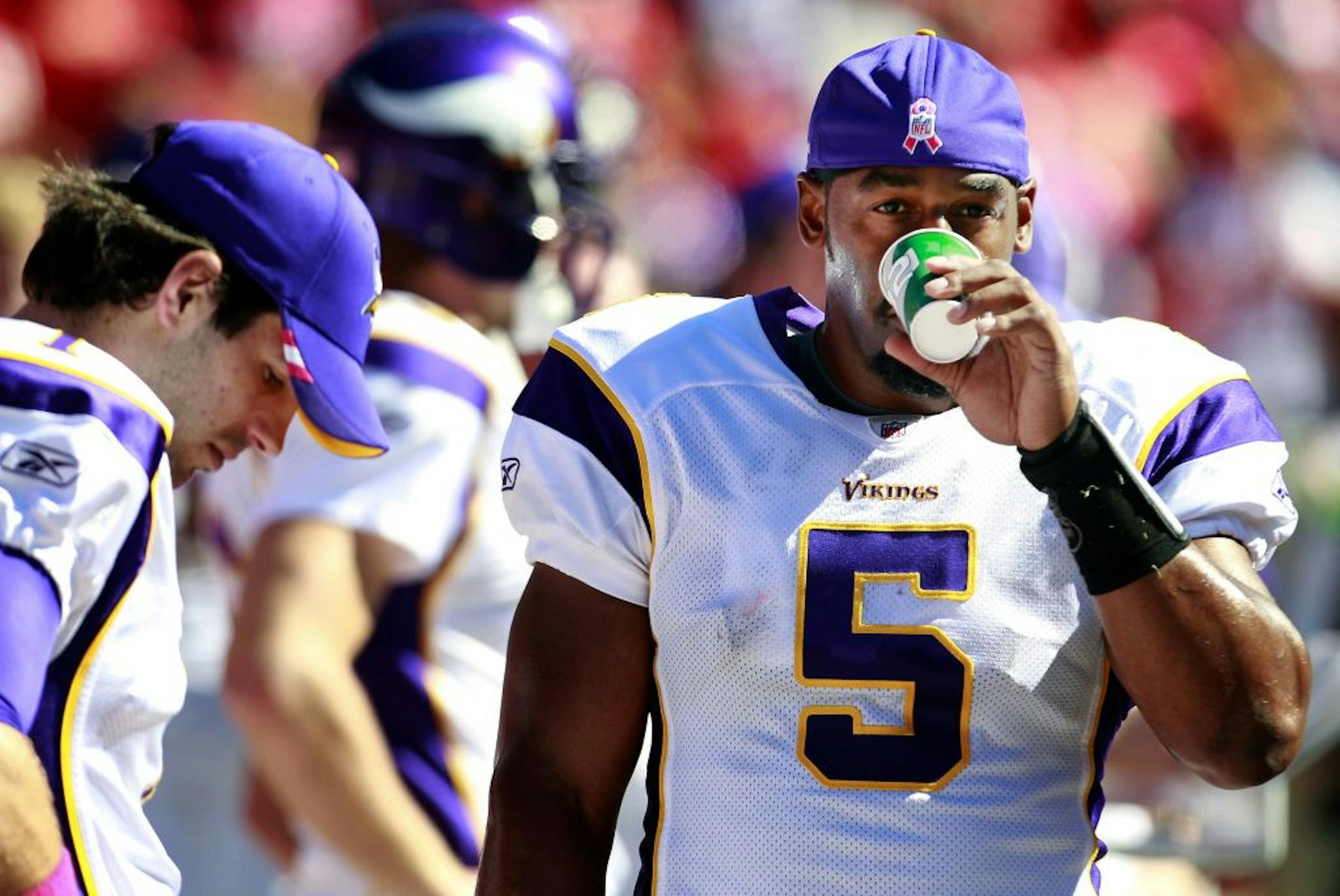 Christian Ponder (left), Donovan McNabb