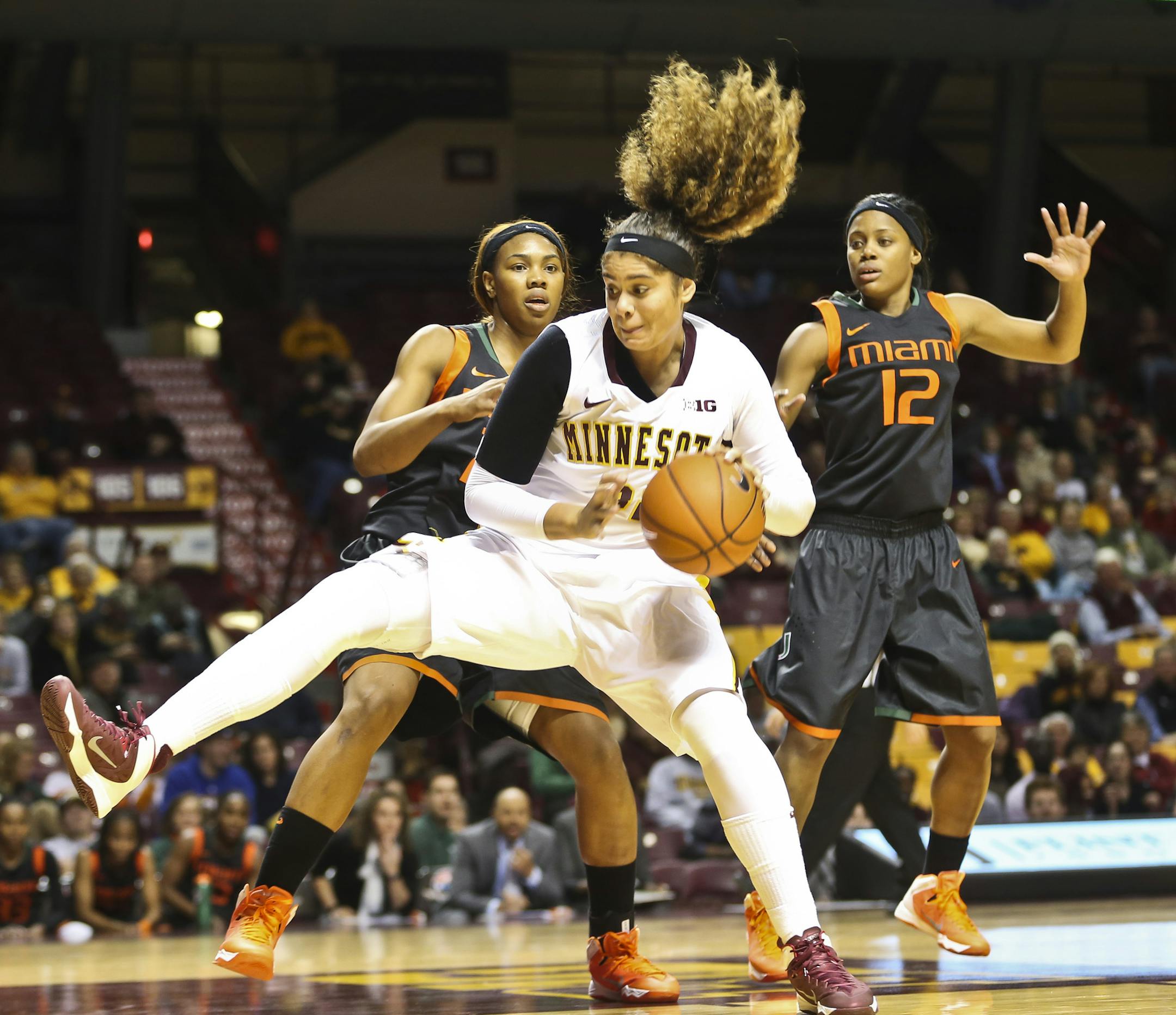 Gopher's #32 Amanda Zahui B. grabbed a rebound in the first half of a basketball game between the Minnesota Gophers and Miami on Thursday, December 5, 2013, at Williams Arena at the University of Minnesota in Minneapolis, Minn. ] RENEE JONES SCHNEIDER • reneejones@startribune.com