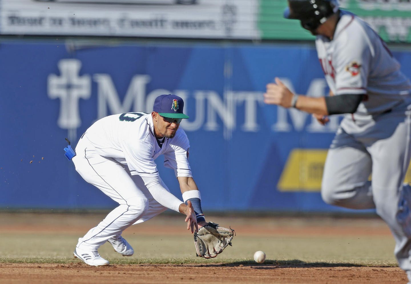 Jim Slosiarek, Cedar Rapids Gazette. Royce Lewis made a play at shortstop during the Kernels' 2018 home opener on April 7.