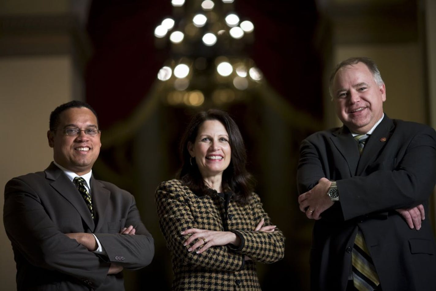 Representatives Keith Ellison (D-MN) (L), Michele Bachmann (R-MN) (C) and Tim Walz (D-MN) (R) pose for a portrait outside the House chamber on Capitol Hill December 17, 2007 in Washington, DC. The trio are finishing their freshmen year in Congress. PHOTO/Brendan SMIALOWSKI for the Minneapolis Star Tribune