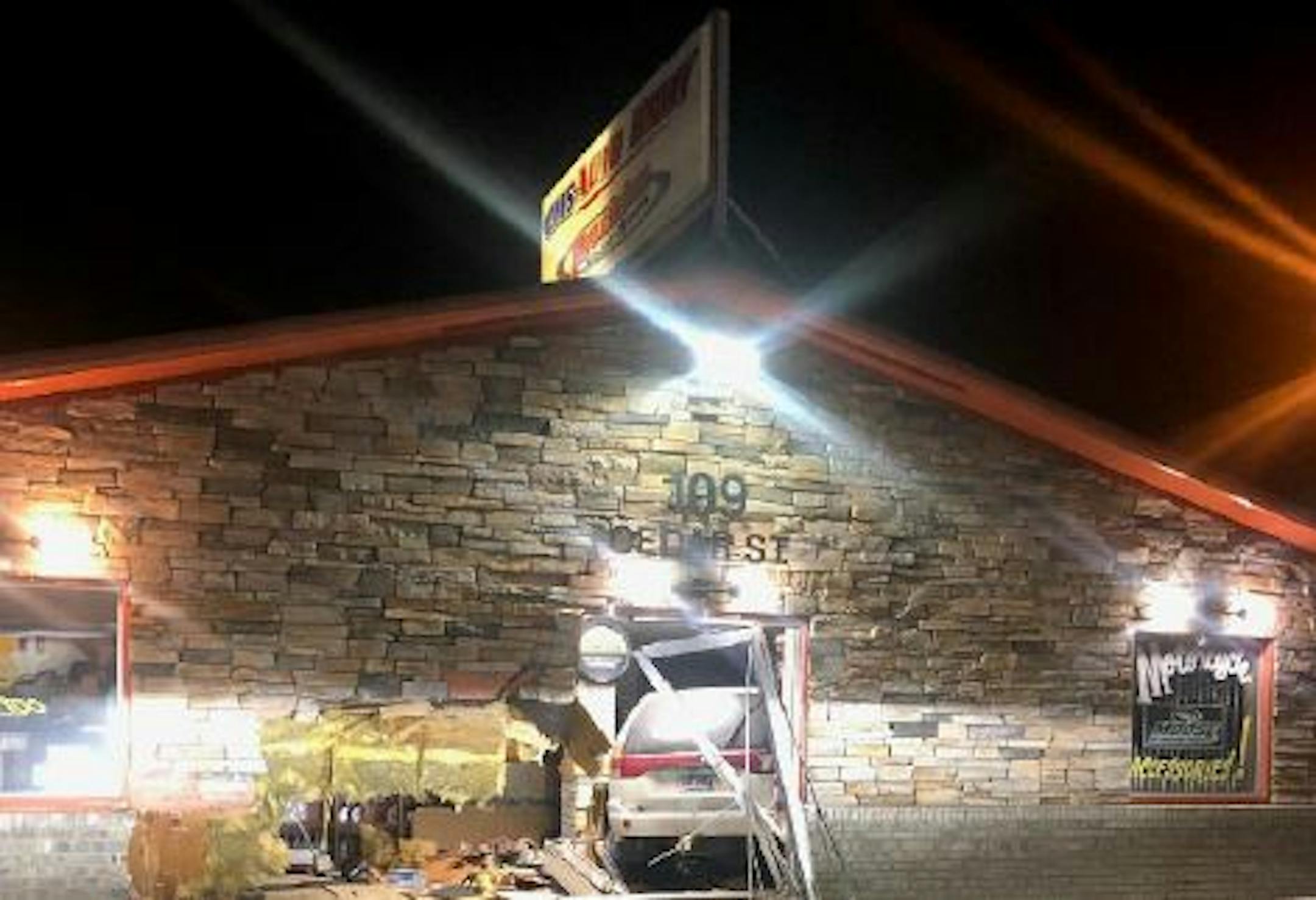 This vehicle came to rest in an auto body repair shop.