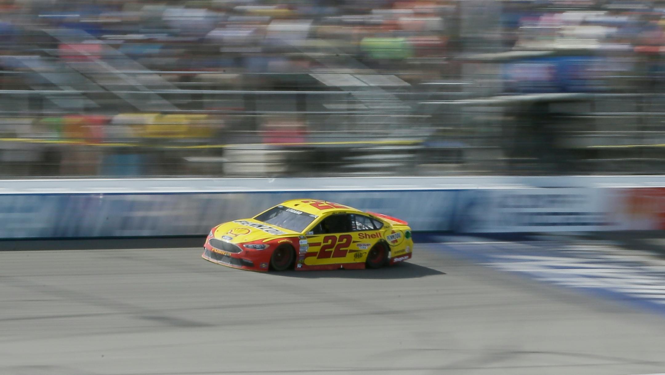 lJoey Logano drives during the NASCAR Sprint Cup series auto race at Michigan International Speedway, Sunday, June 12, 2016 in Brooklyn, Mich. (AP Photo/Carlos Osorio)