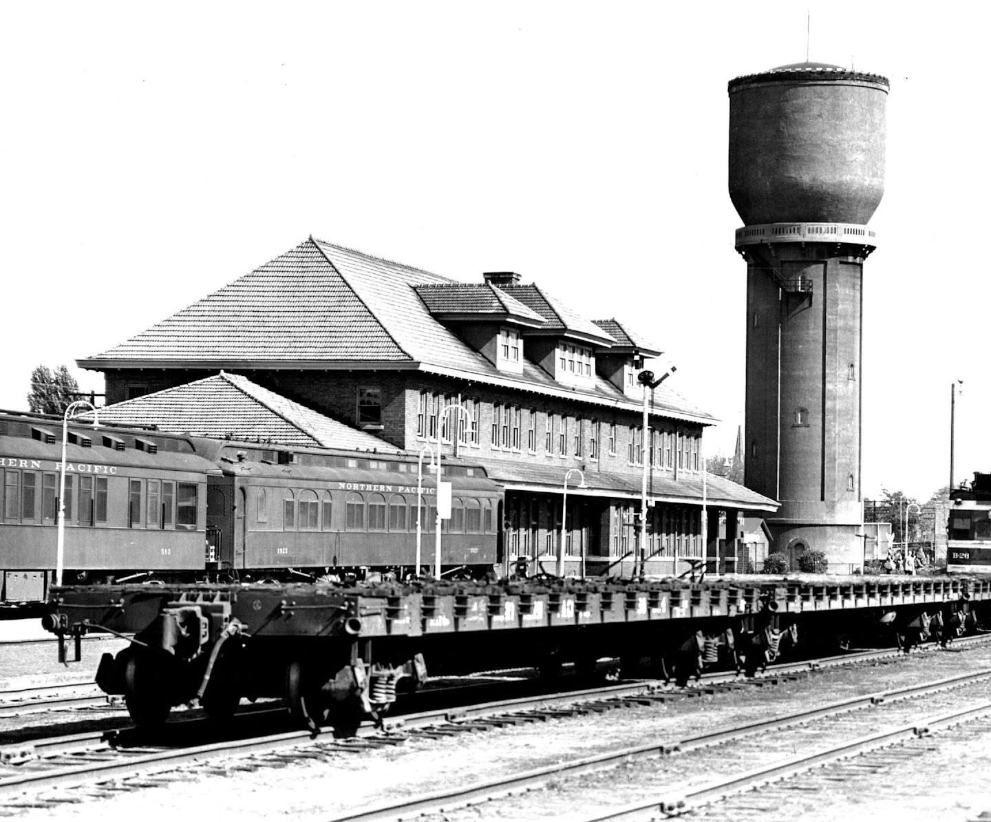 January 4, 1952 &#x201c;The city&#x2019;s landmark is the water tower, built on the spot where the Northern Pacific once had its headquarters. The 'tower is 134 feet tall, has a capacity of 300,000 gallons. At the base of the water tower is the tourist bureau. Where the depot now stands, the railroad built a Headquarters hotel. Both hotel and headquarters buildings were completed in 1872. Brainerd was booming. It had a population of 1,864 in 1880 and 7,150 just five years later.&#x201d; Minneapo