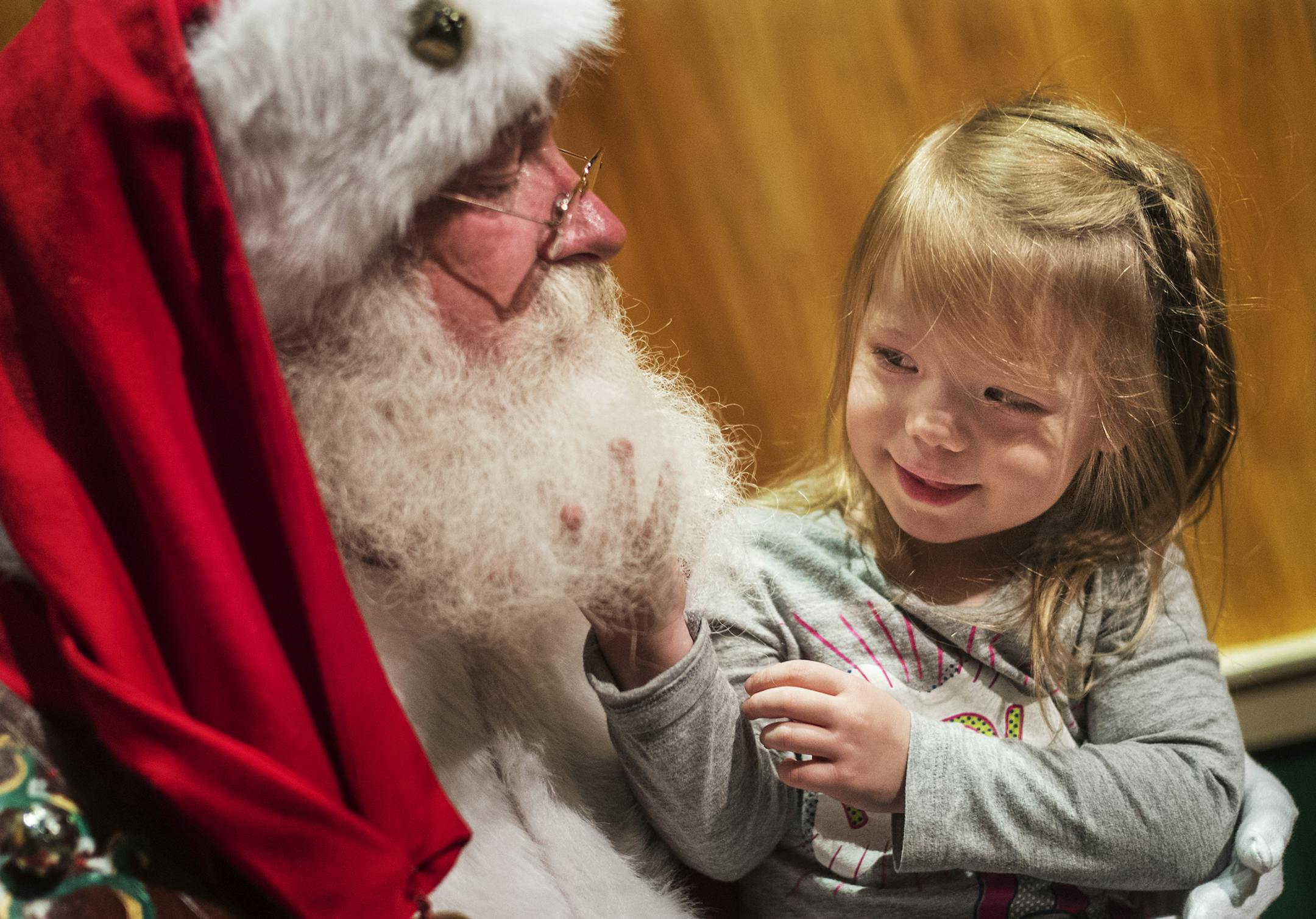 Savanna Deotis,3, checked to make sure Kris Kringle's beard was authentic. He confirmed that it was all his. ]Macy's Santaland exhibit on the 8th floor of the downtown Macy's. This is a holiday favorite for la lot of of families.Richard Tsong-Taatarii/rtsong-taatarii@startribune