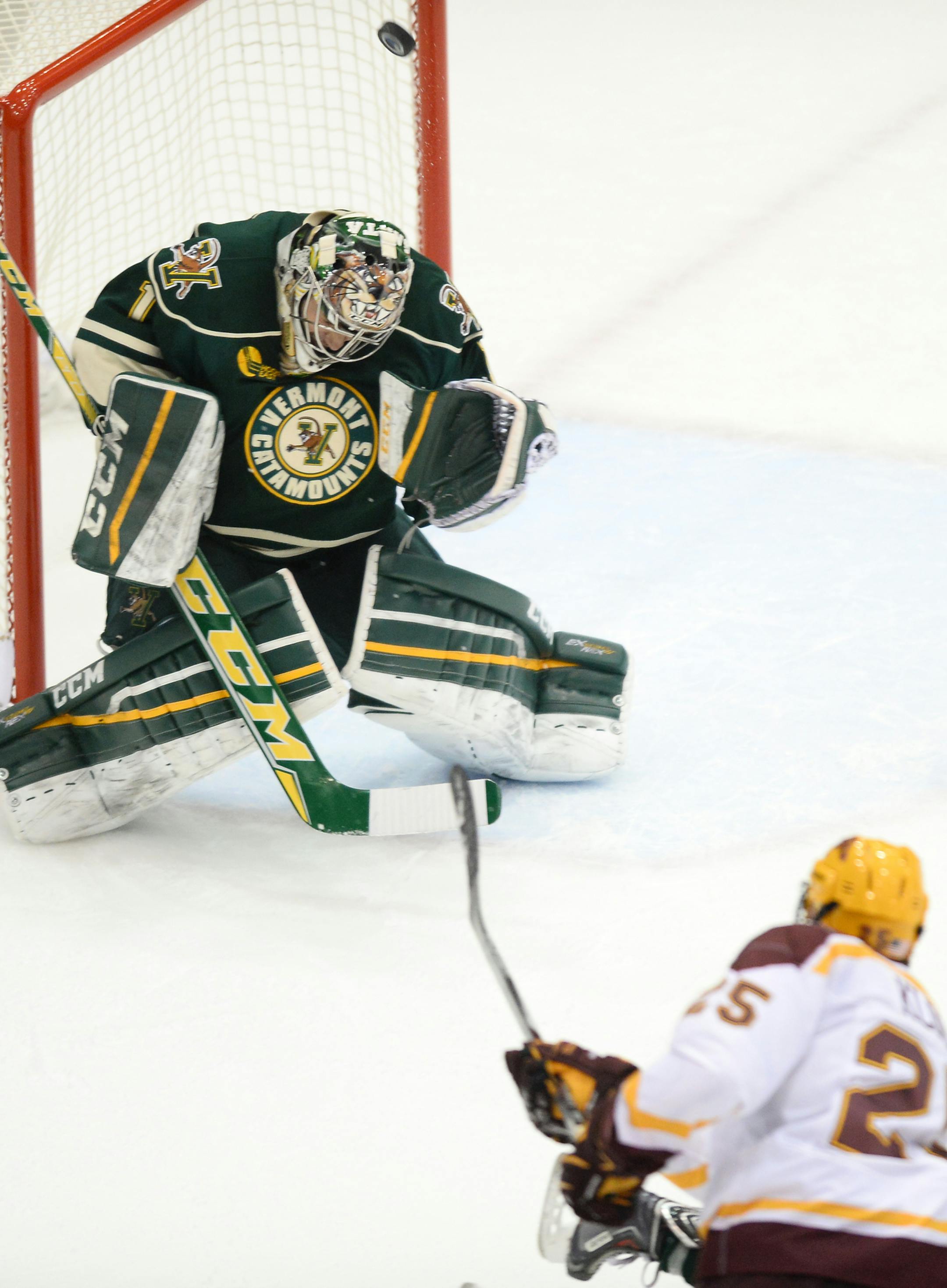 University of Minnesota center Justin Kloos (25) attempted a shot on Vermont goalie Mike Santaguida (1) in the first period. ] Aaron Lavinsky • aaron.lavinsky@startribune.com The University of Minnesota Golden Gophers men's hockey team played the Vermont Catamounts on Saturday, Oct. 10, 2015 at Mariucci Arena in Minneapolis.