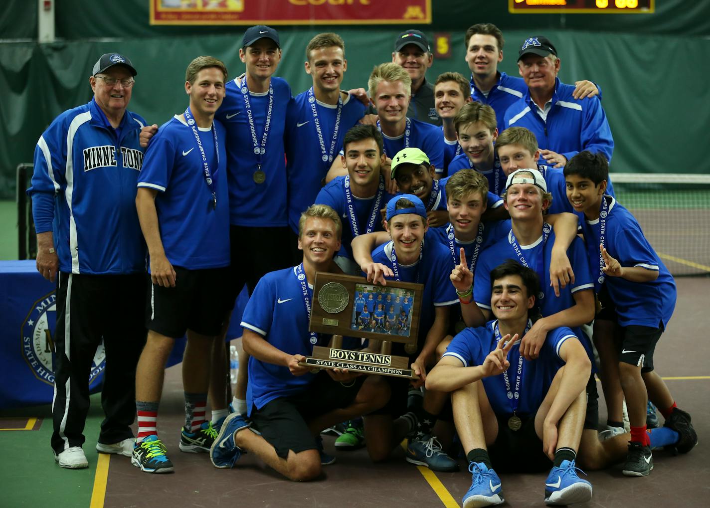 Minnetonka players and coaches celebrated with their championship hardware Wednesday afternoon (Jeff Wheeler, Star Tribune)