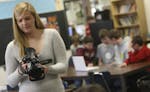 Kirsten Peterson, of Cutaway Productions, a student-run video production company from Stillwater High School, shot video of Stonebridge Elementary sch