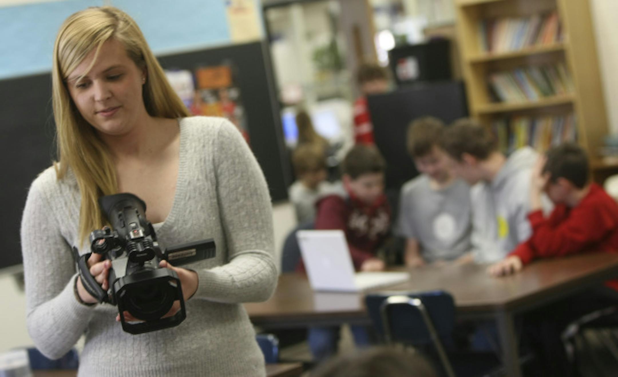 Kirsten Peterson, of Cutaway Productions, a student-run video production company from Stillwater High School, shot video of Stonebridge Elementary school students.