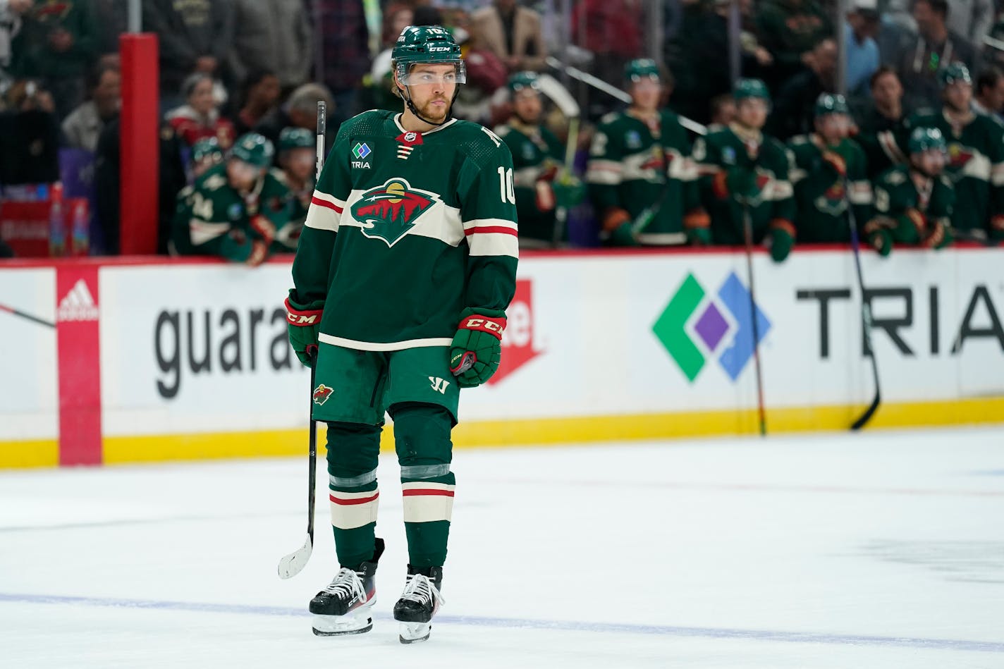 Minnesota Wild center Tyson Jost (10) stands on the ice during the second period of an NHL preseason hockey game against the Chicago Blackhawks, Thursday, Oct. 6, 2022, in St. Paul. (AP Photo/Abbie Parr)