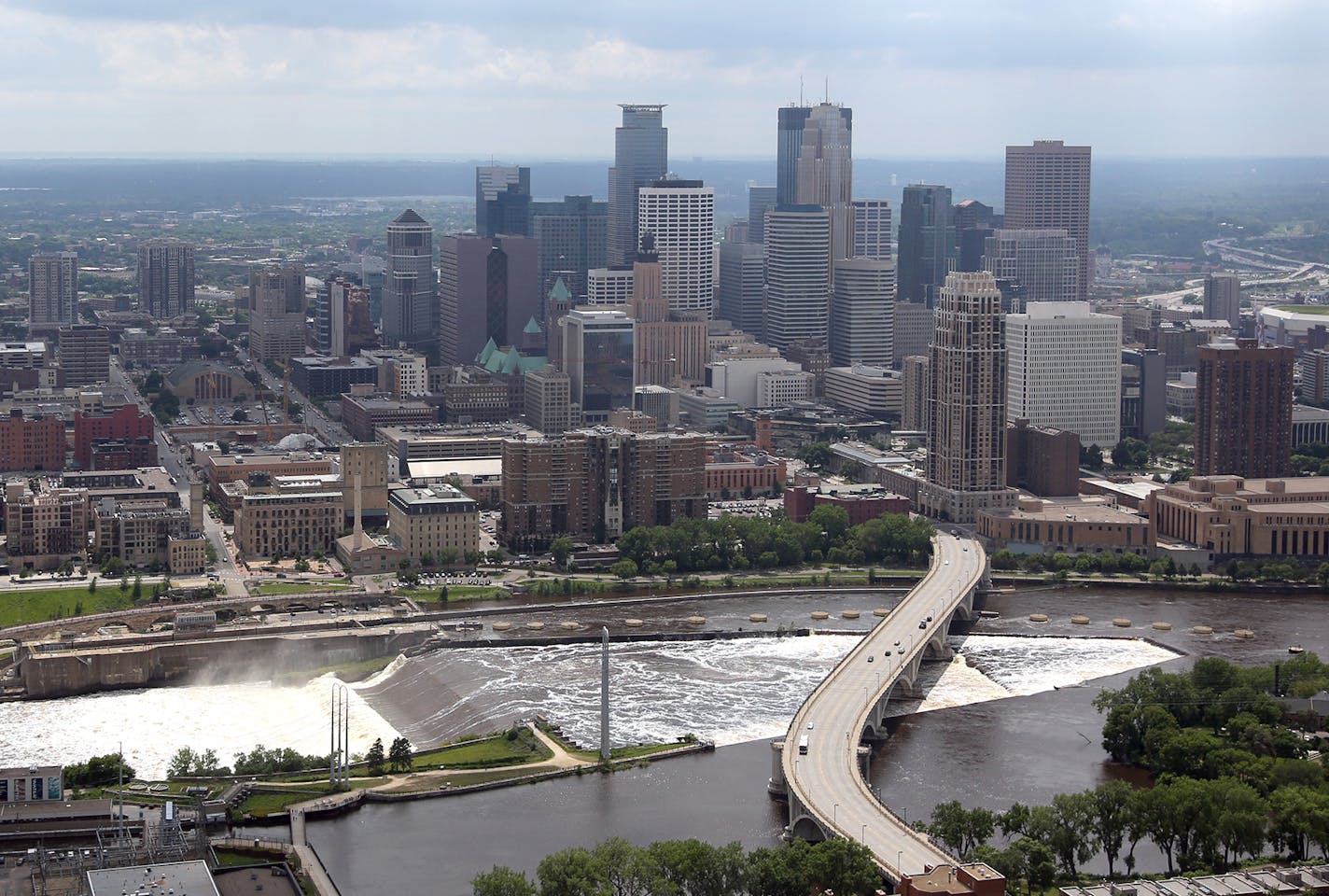 Kyndell Harkness flew for flooding photos and made some photos for the archives Minneapolis, St Paul, TCF stadium, The Viking Stadium construction, and skyline photos. Mystic lake and Valley Fair too. ORG XMIT: MIN1407112224231373