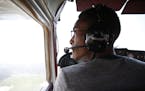 Hasan Swain, 17, during a instructed flight over DuPage Country Airport in on July 10, 2015 in West Chicago, Ill. (Michael Noble Jr./Chicago Tribune/T