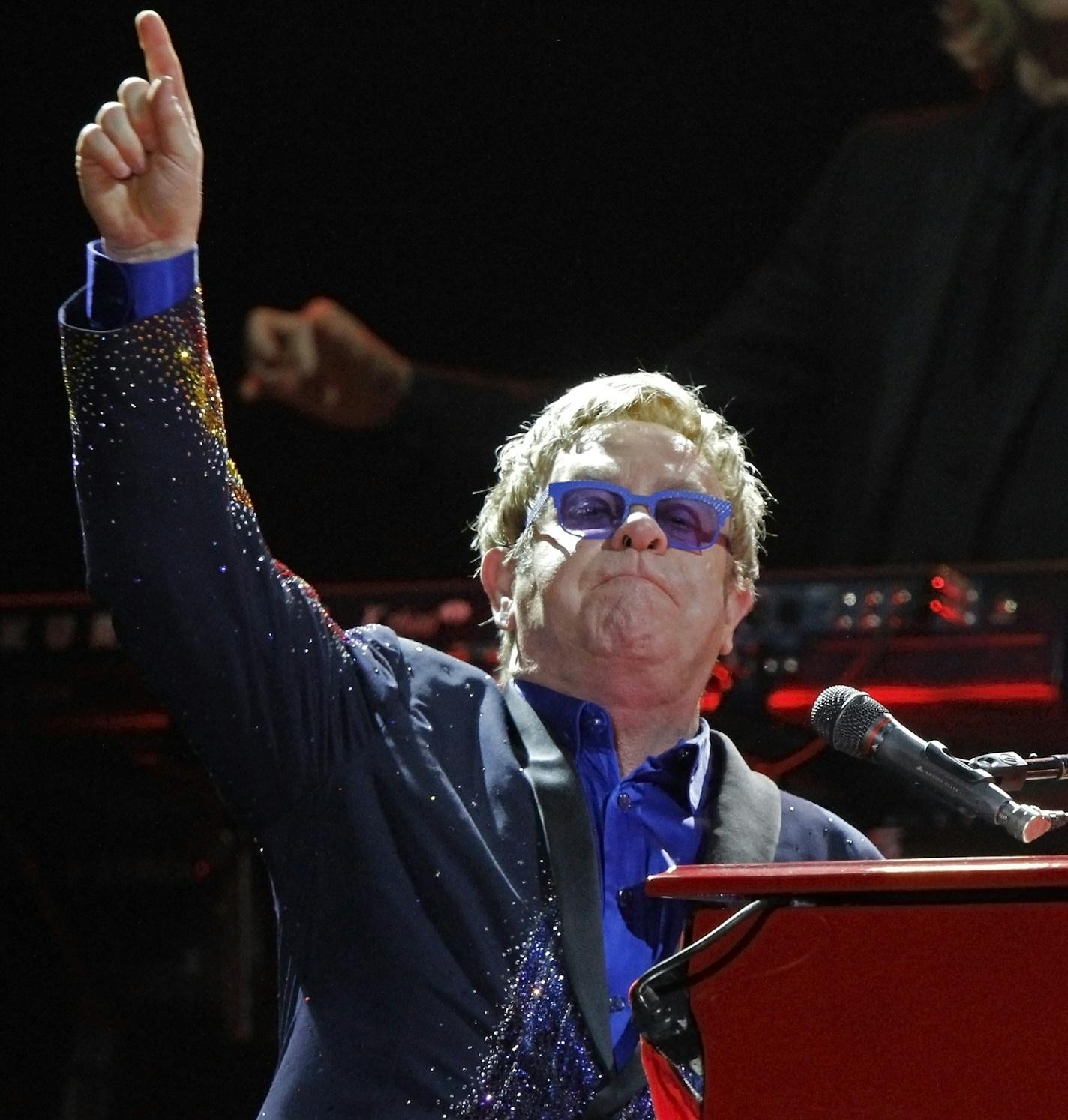 Elton John performs at the Bonnaroo Music and Arts Festival on Sunday, June 15, 2014, in Manchester, Tenn. (Photo by Wade Payne/Invision/AP)