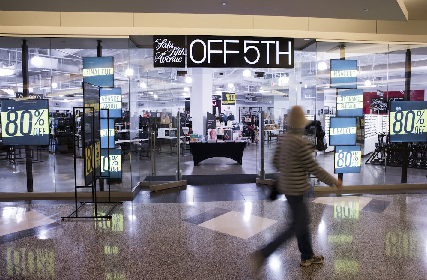 Saks Off Fifth seen on the skyway level of the City Center Building. ] LEILA NAVIDI &#x2022; leila.navidi@startribune.com BACKGROUND INFORMATION: The retail scene on Nicollet Mall on Friday, February 24, 2017. Just across the street from the Macy's shuttering on Nicollet Mall, a Nordstrom Rack is going in this fall. It joins a recently-relocated Saks Off Fifth and a Marshalls store on the block. While main line department stores are struggling, these off-price concepts have been surging because