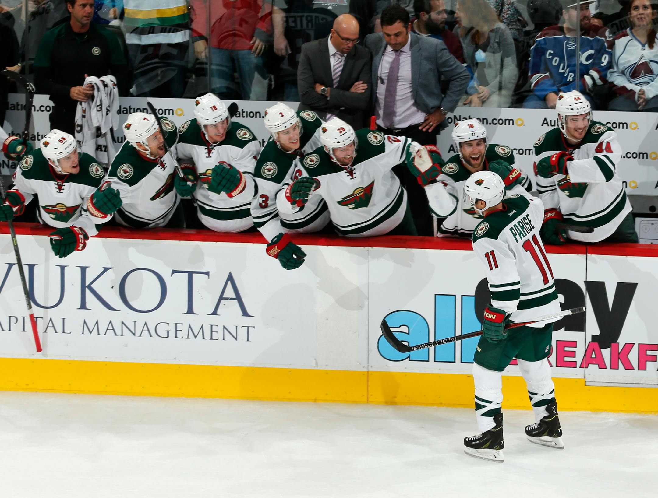 Wild left winger Zach Parise celebrated his hat trick with teammates on the bench during the third period of Minnesota's 5-4 victory over Colorado on Thursday.