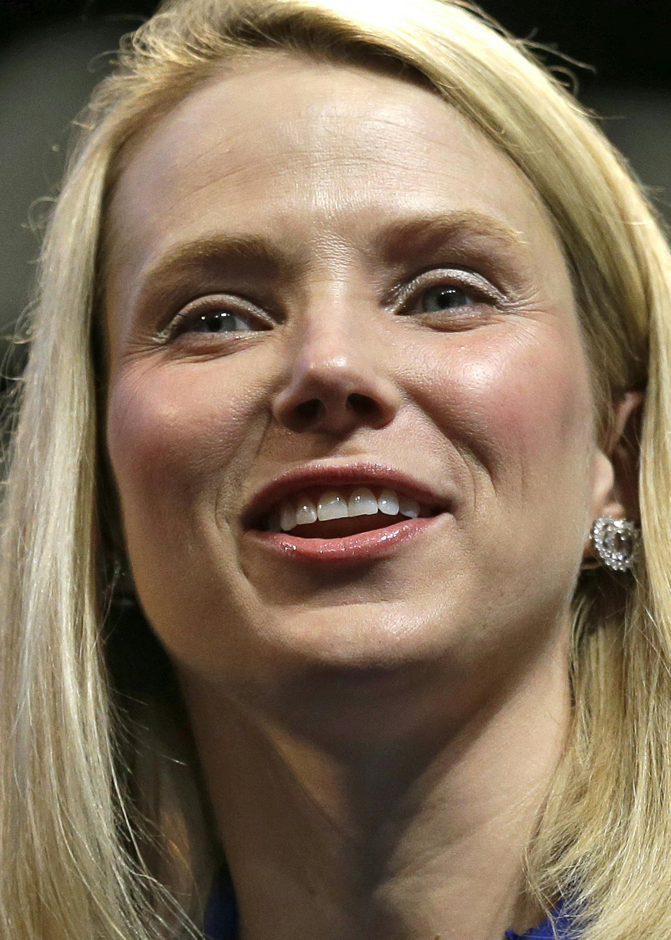 FILE - In this Tuesday, June 17, 2014, file photo, Yahoo CEO Marissa Mayer attends the Cannes Lions 2014, 61st International Advertising Festival in Cannes, France. Mayer gave birth to twin girls Thursday, the day after unveiling plans to hatch a new company to control Yahoo's Internet business. This is the second time that the 40-year-old Mayer has given birth since Yahoo hired her as CEO in July 2012. She and her husband have a 3-year-old son. (AP Photo/Lionel Cironneau, File)