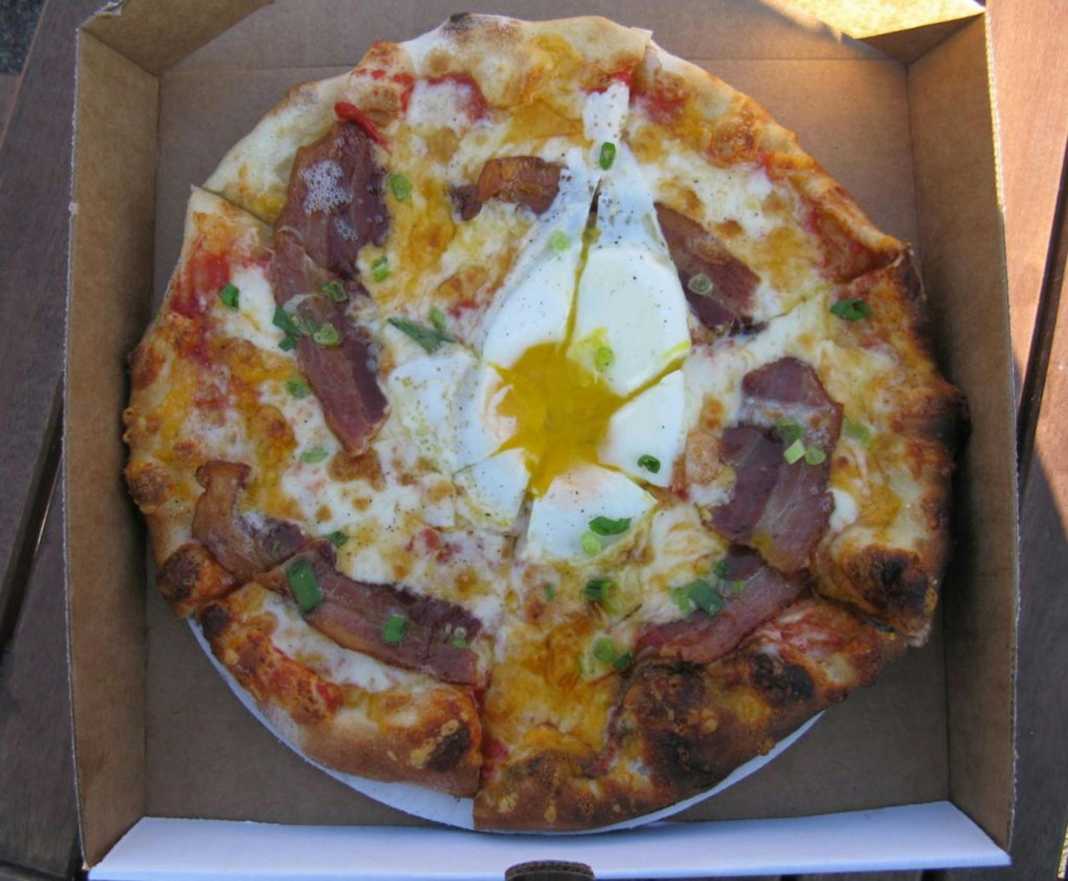 Big River Pizza features the Red Rooster pizza for morning shoppers.