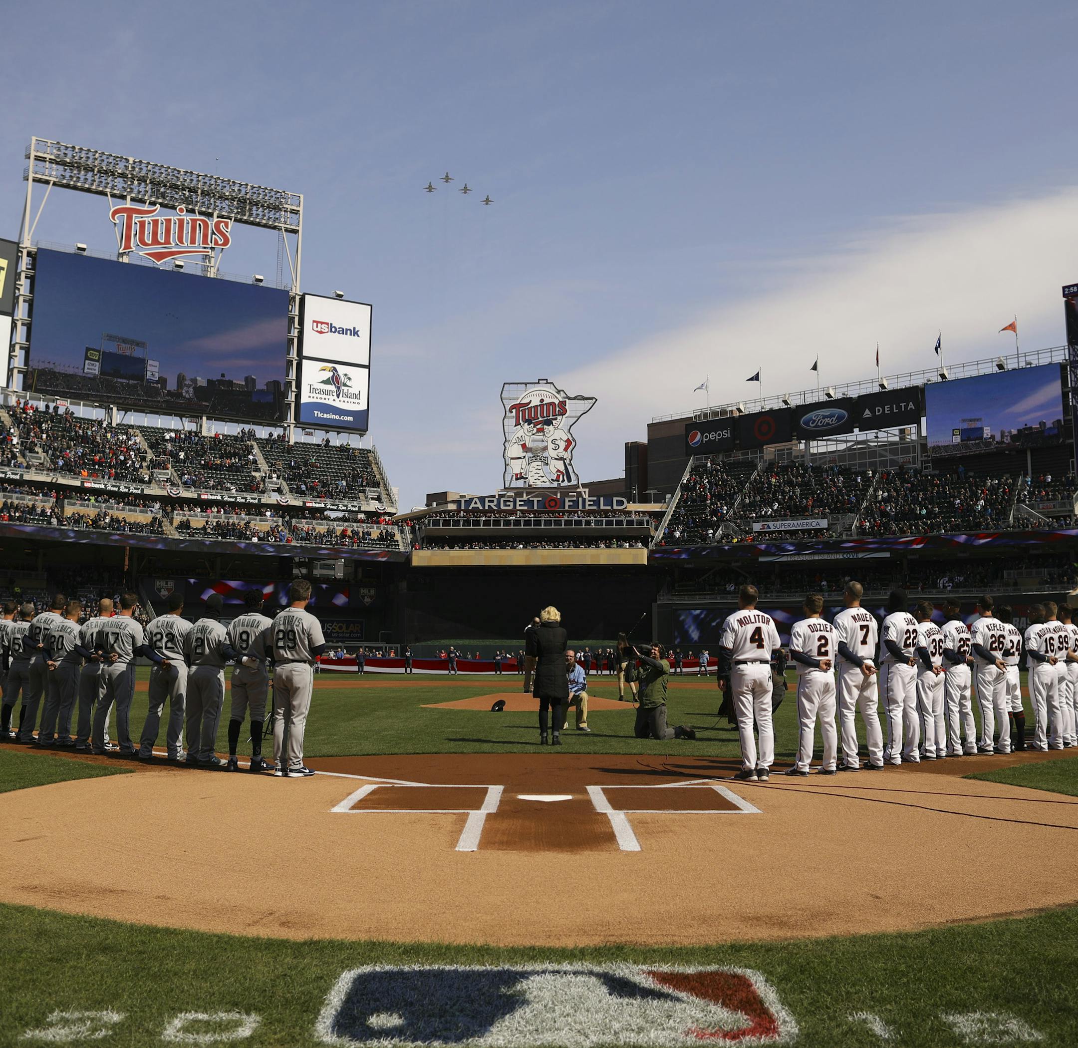 With Dessa singing the national anthem, four T-38s from the United States Air Force performed a flyover above Target Field. ] JEFF WHEELER ï jeff.wheeler@startribune.com The Minnesota Twins played the Seattle Mariners in their home opener Thursday afternoon, April 5, 2018 at Target Field in Minneapolis.