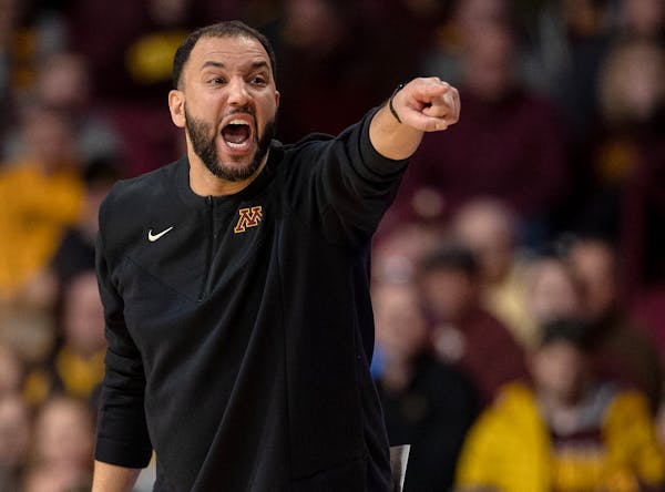Gophers coach Ben Johnson instructed his team in the first half of Monday’s loss to Illinois at Williams arena.