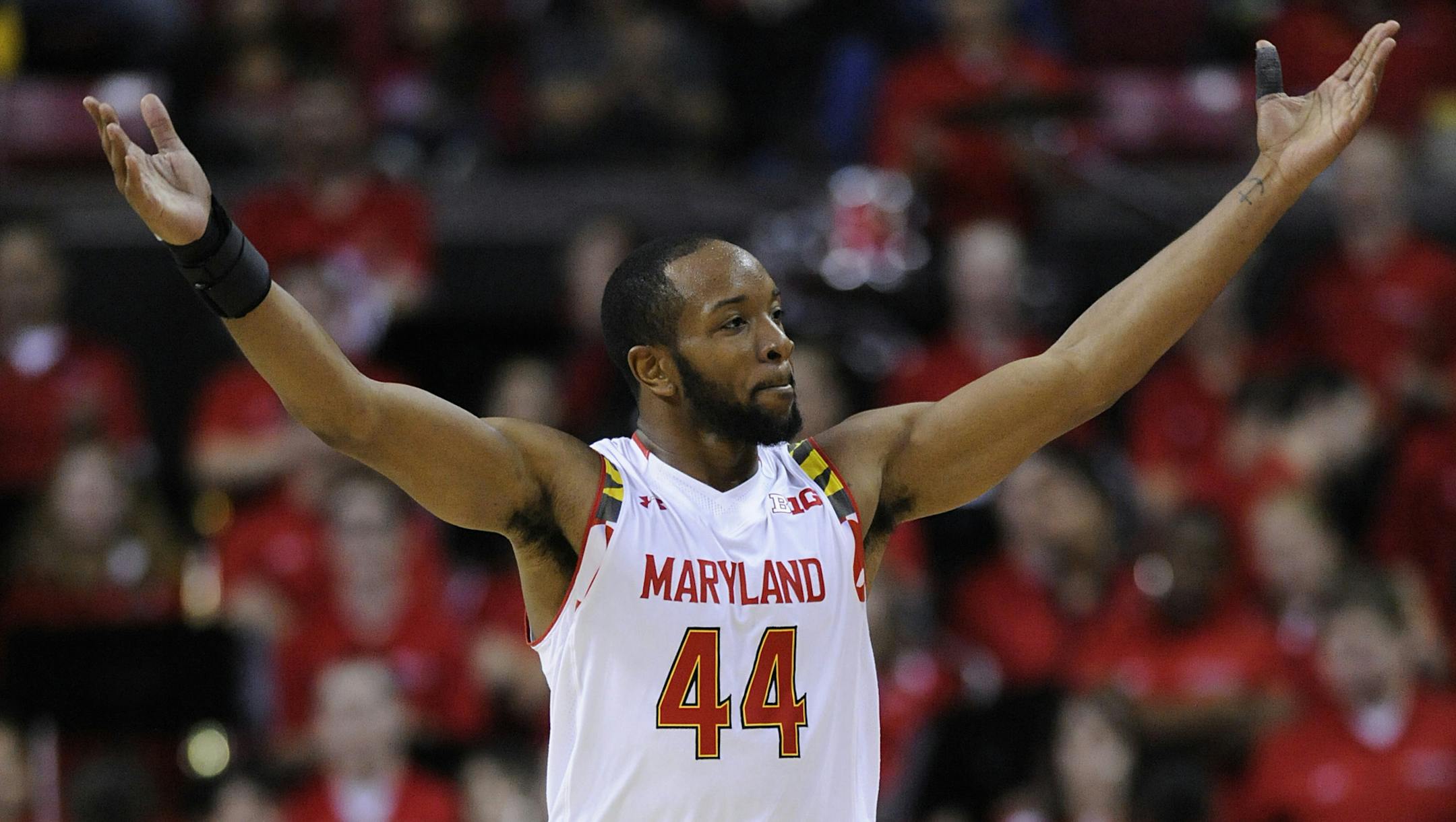 Maryland guard Dez Wells calls to the crowd after his team took a significant lead over Oakland during the second half of an NCAA college basketball game Saturday, Dec. 27, 2014, in College Park, Md. Maryland won 72-56. (AP Photo/Gail Burton) ORG XMIT: MDGB110
