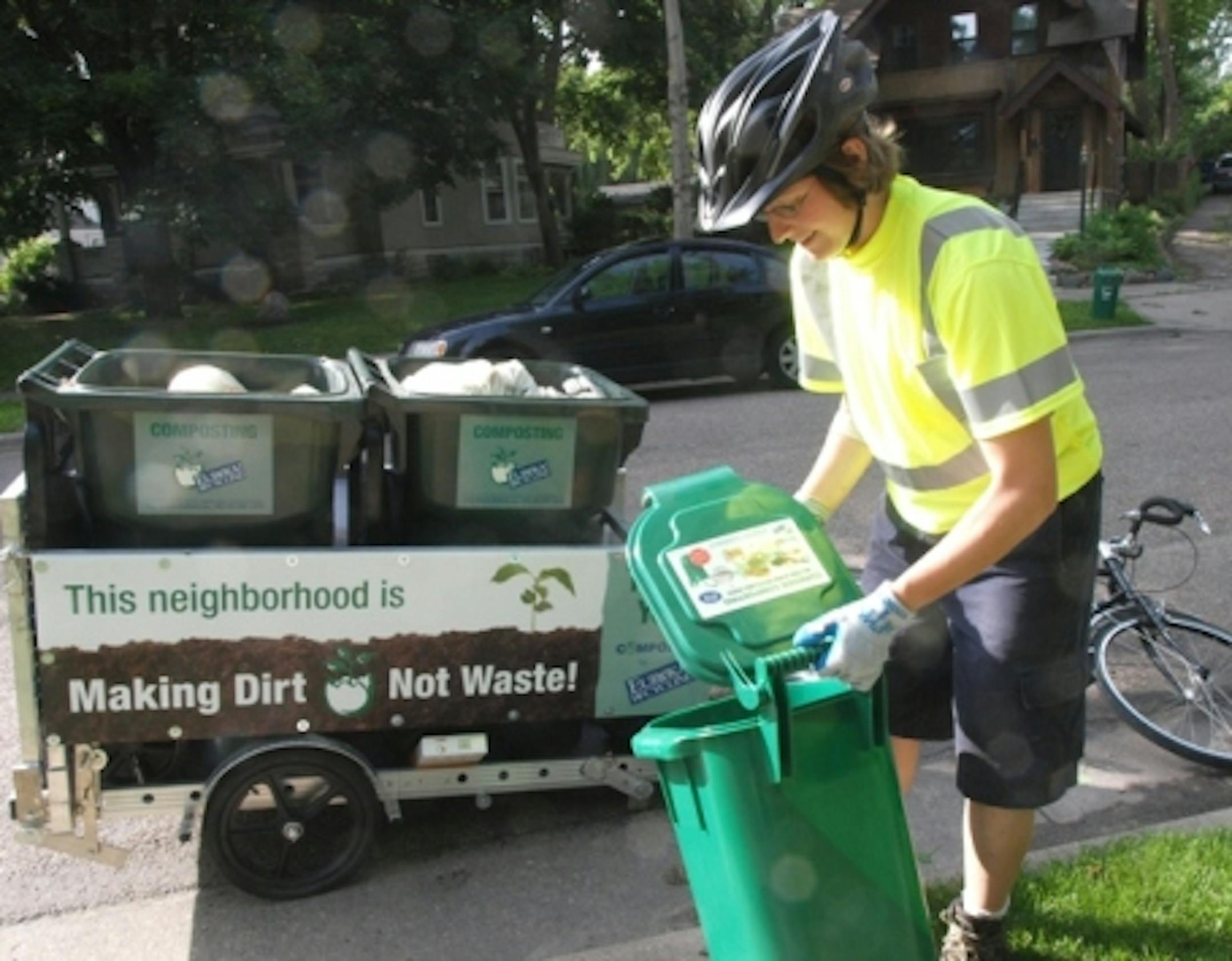 Sonya Ewer, of Eureka Recycling collects compostables on bicycle