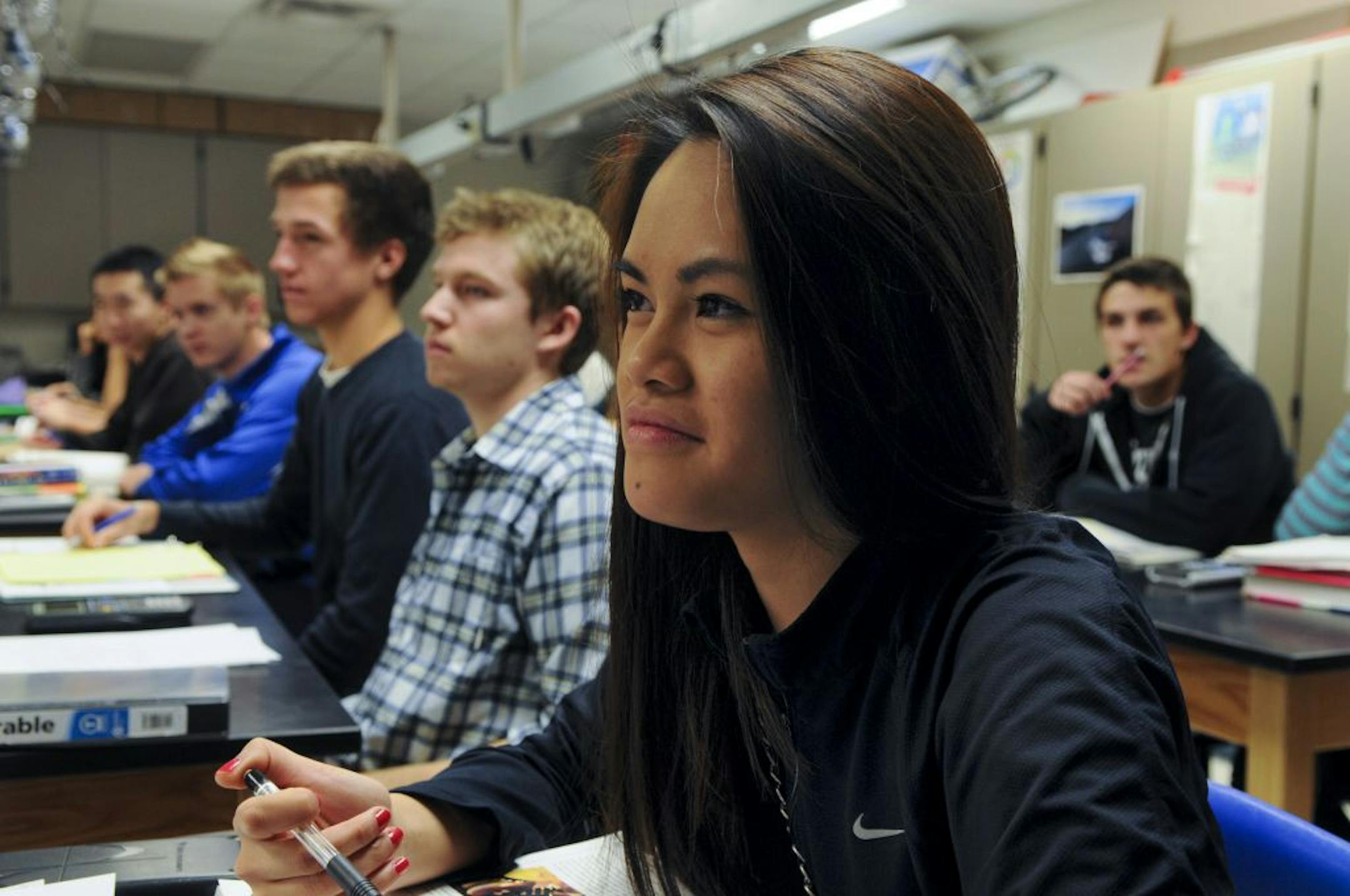 Nesteene Param 17 years old was listening to a lecture on motion in AP Physics class at Woodbury High, on Wednesday November 16, 2011. South Washington was recently awarded for increasing its AP course offerings and the passing rate for the courses. Since 2009 South Washington County School District increased the number of students participating in AP exams from 579 to 1292 while improving the percentage of students earning AP Exam scores of 3 or higher from 59% in 2009 to 66% in 2011, and havin