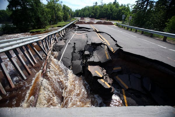 A portion of Highway 35 over Black River in Superior, WI was destroyed over the weekend due to heavy flooding after ten inches of rain fell on the are