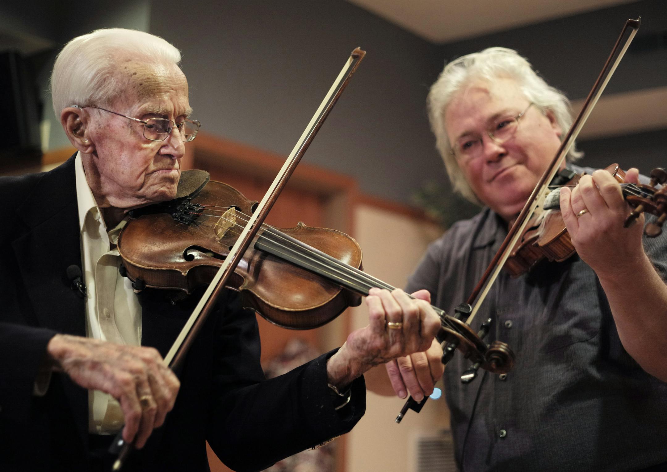 At Stonecrest Senior Living, Llyod Johnson, who turned 100 Wednesday, got the chance to play fiddle with virtuoso Peter Ostroushko. Johnson felt humbled to play with the great artist.