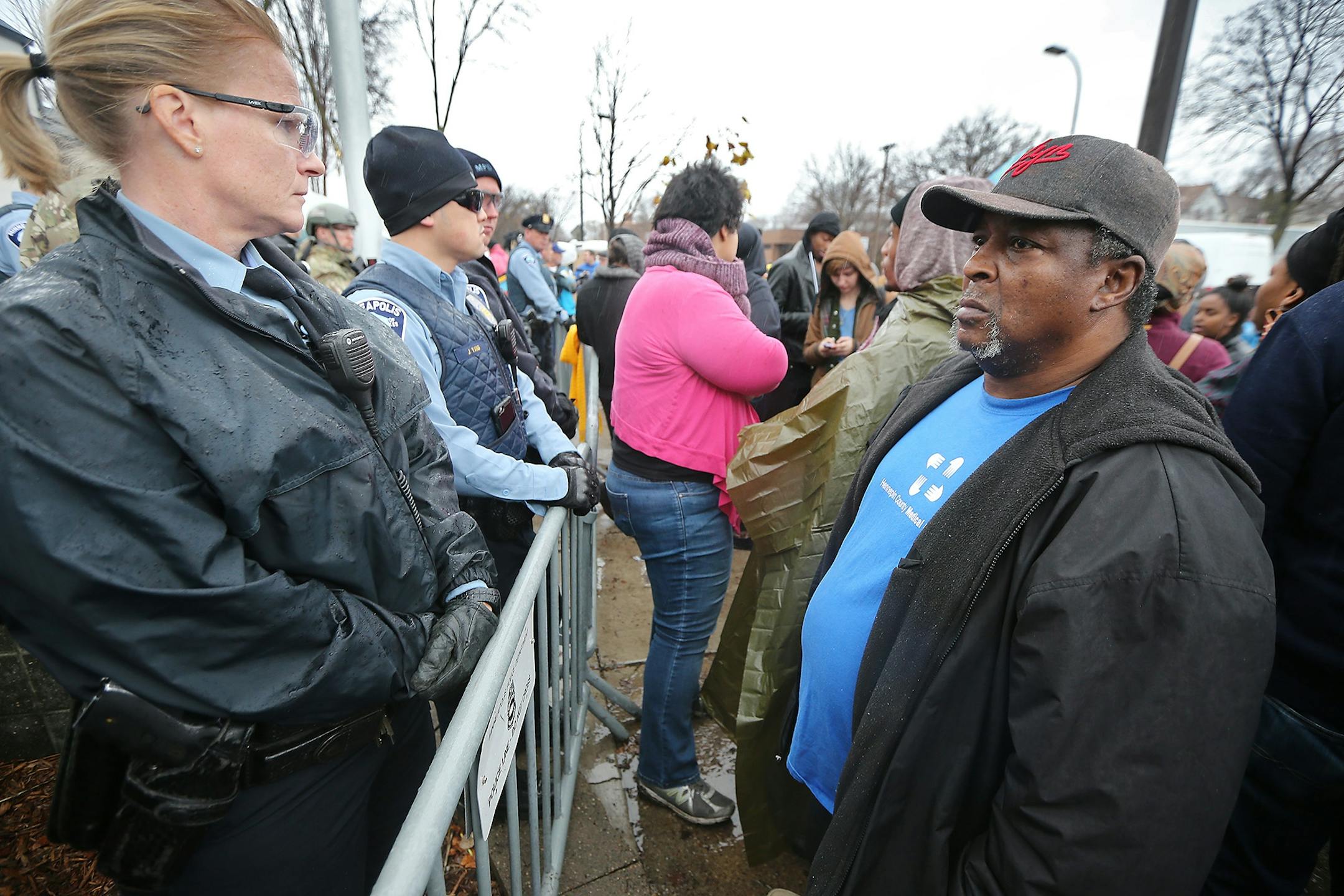 Jamar Clark's father James Hill faced police during a protest at the Fourth Police Precinct, Wednesday, November 4, 2015 in Minneapolis, MN.