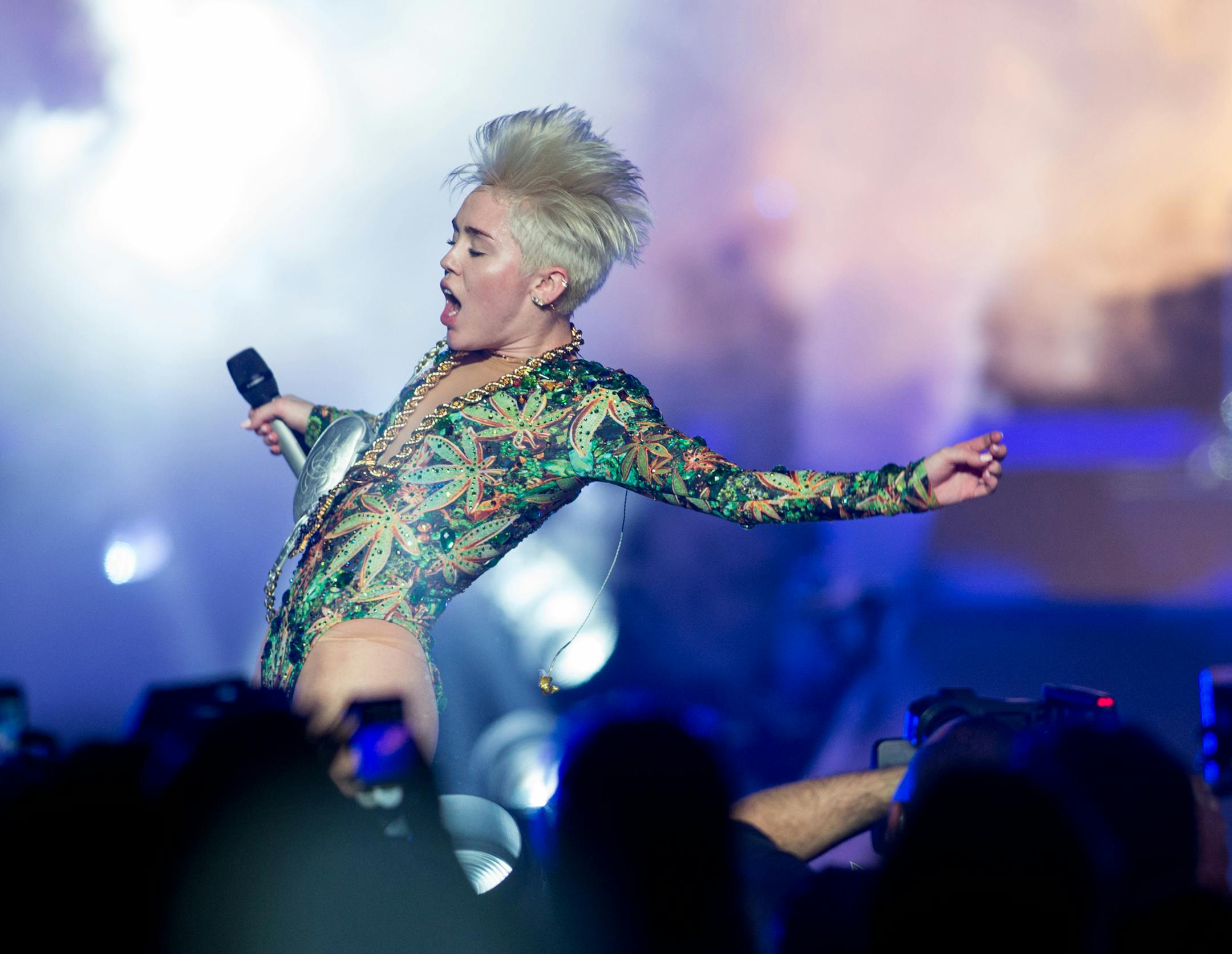 Miley Cyrus performs on stage at Staples Center, on Saturday, February, 22, 2014 in Anaheim, Calif. (Photo by Paul A. Hebert/Invision/AP) ORG XMIT: INVW