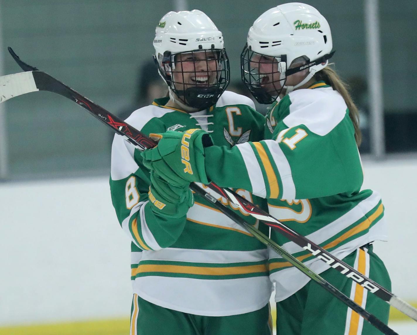 Edina's Mallory Uihlein (8) celebrates her game winning goal with teammate Annie Kuehl (11) during the third period of their 3-2 win over Blake during the Girls' hockey, Class 2A, Section 6 final Friday, Feb. 15, 2019, at Parade Ice Garden in Minneapolis, MN.] DAVID JOLES &#x2022;david.joles@startribune.com Girls' hockey, Class 2A, Section 6 final