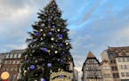 The tallest decorated Christmas tree in Europe is set up on the Place Kl'ber. MUST CREDIT: Photo for The Washington Post by