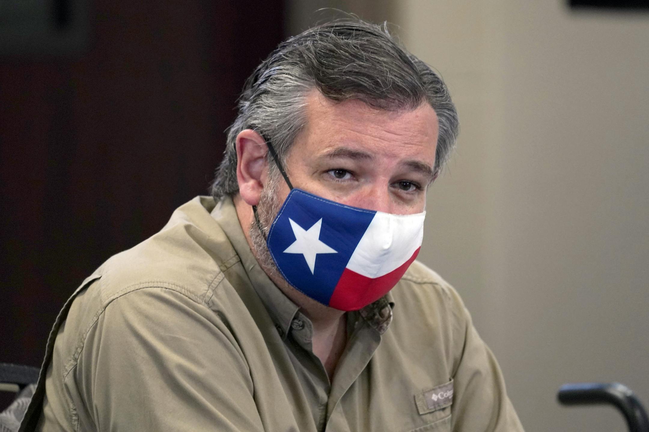 Sen. Ted Cruz, R-Texas, listens as President Donald Trump speaks during a briefing about Hurricane Laura with first responders at the emergency operations center Saturday, Aug. 29, 2020, in Orange, Texas. (AP Photo/Alex Brandon)