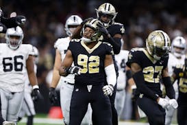 New Orleans Saints defensive end Marcus Davenport (92) celebrates after a play during the first half of an NFL football game against the Las Vegas Rai