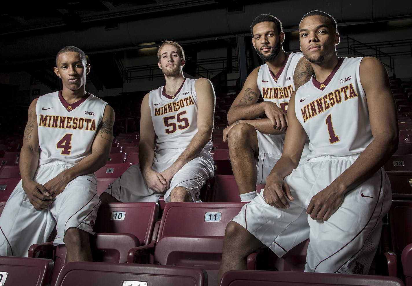 University of Minnesota seniors DeAndre Mathieu (4), Elliott Eliason (55), Mo Walker (15) and Andre Hollins (1). ] CARLOS GONZALEZ cgonzalez@startribune.com - October 21, 2014 , Minneapolis, MN, Williams Arena, University of Minnesota Men&#x201a;&#xc4;&#xf4;s Basketball, Gophers, Gophers basketball media