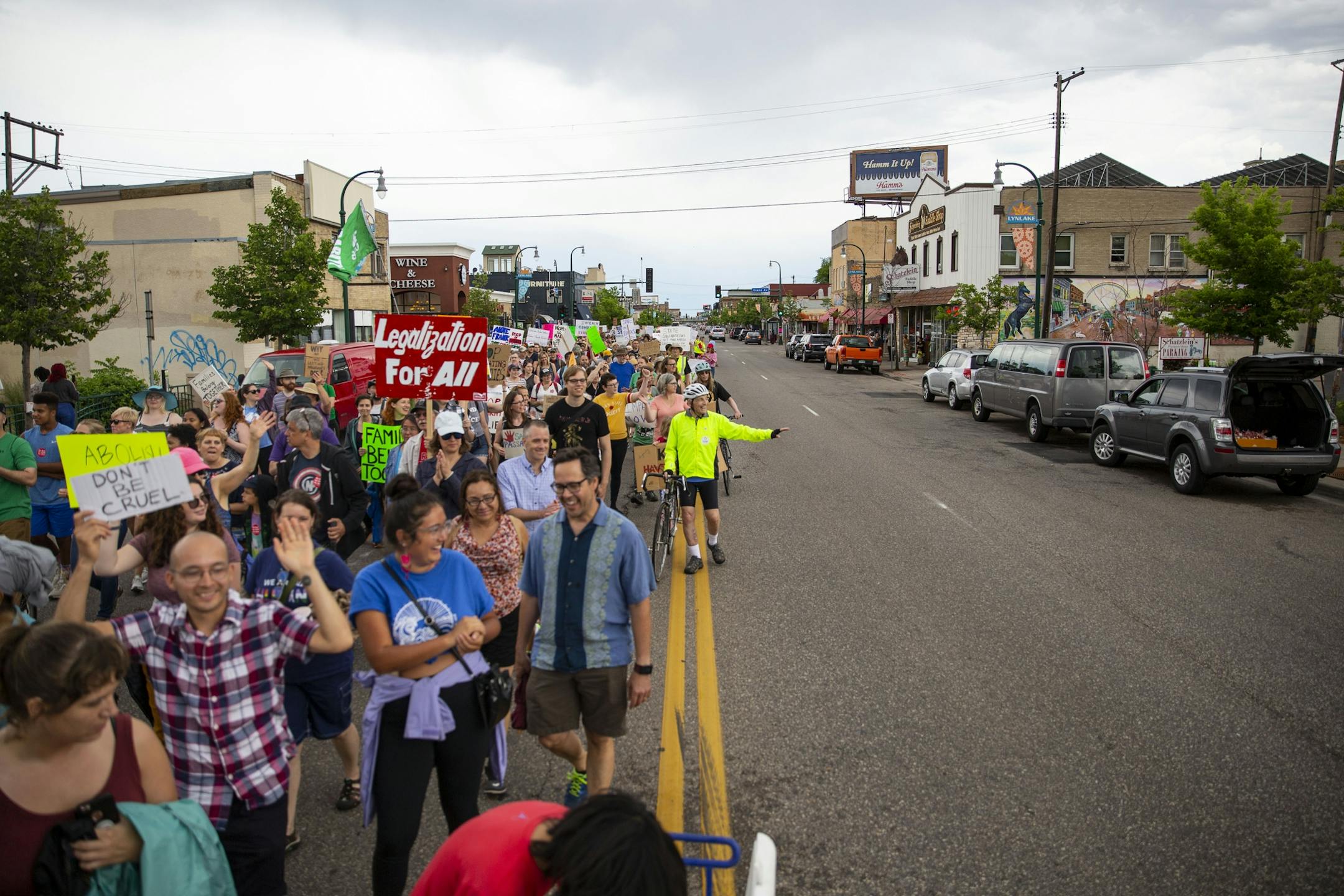 Thousands of protestors march down Lake St. shutting down one way of traffic. ALEX KORMANN ¥ alex.kormann@startribune.com Approximately 1,000 people marched through the streets of Minneapolis on Sunday June 30, 2019 protesting the treatment of migrants on the U.S. border. "Stop separating families, close the camps," said Mari Mansfield, an organizer for the event.