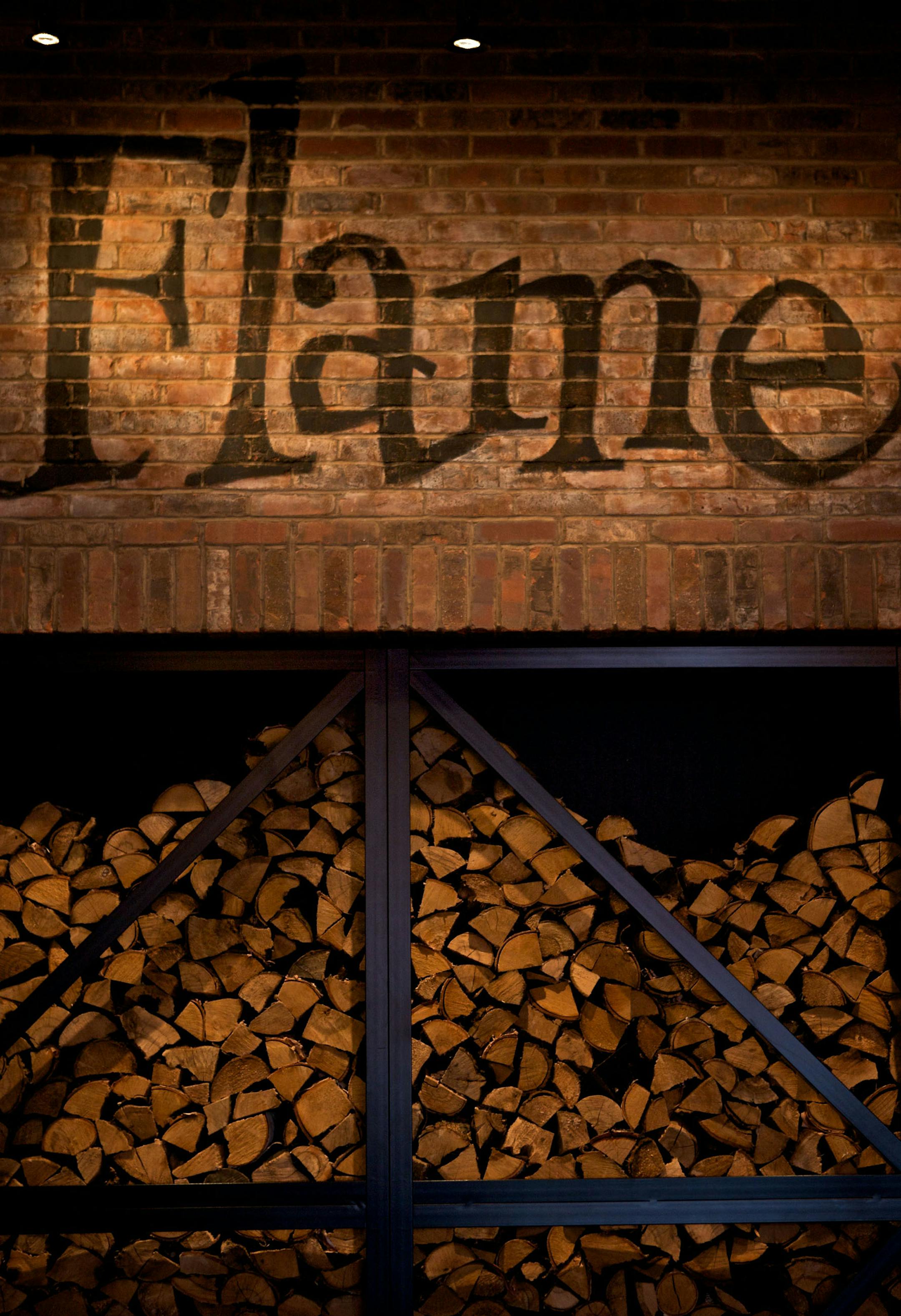 Flame restaurant prides itself on its flame-roasted food as you can see by the large stack of firewood in the dining room.