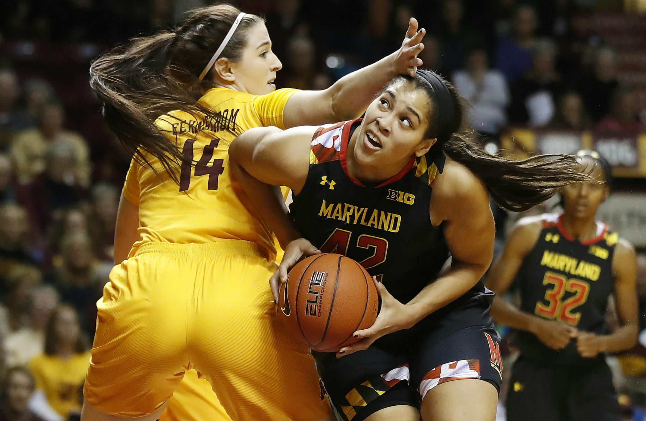 Maryland Terrapins center Brionna Jones (42) went around Minnesota Golden Gophers center Bryanna Fernstrom (14) to score in the first half of the Big Ten home opener at Williams Arena Sunday January 1,2017 in Minneapolis, MN.] The University of Minnesota hosted the Maryland in the Big Ten home opener at Williams Arena. Jerry Holt / jerry. Holt@Startribune.com