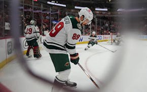 Minnesota Wild center Frederick Gaudreau warms up before an NHL hockey game against the Chicago Blackhawks, Wednesday, Feb. 7, 2024, in Chicago. (AP P