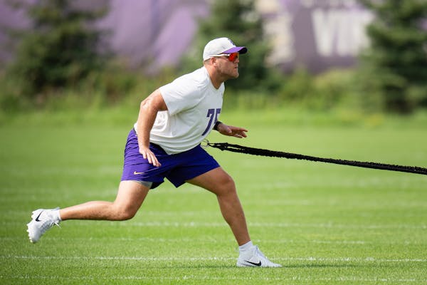 Tackle Brian O'Neill (75) continues to recover from an achilles tear during Minnesota Vikings practice at TCO Performance Center in Eagan, Minn., on F