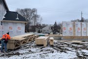 Housing construction fell 35% in the Twin Cities in 2023 compared with 2022. That makes sights like this — two houses being built next to each other