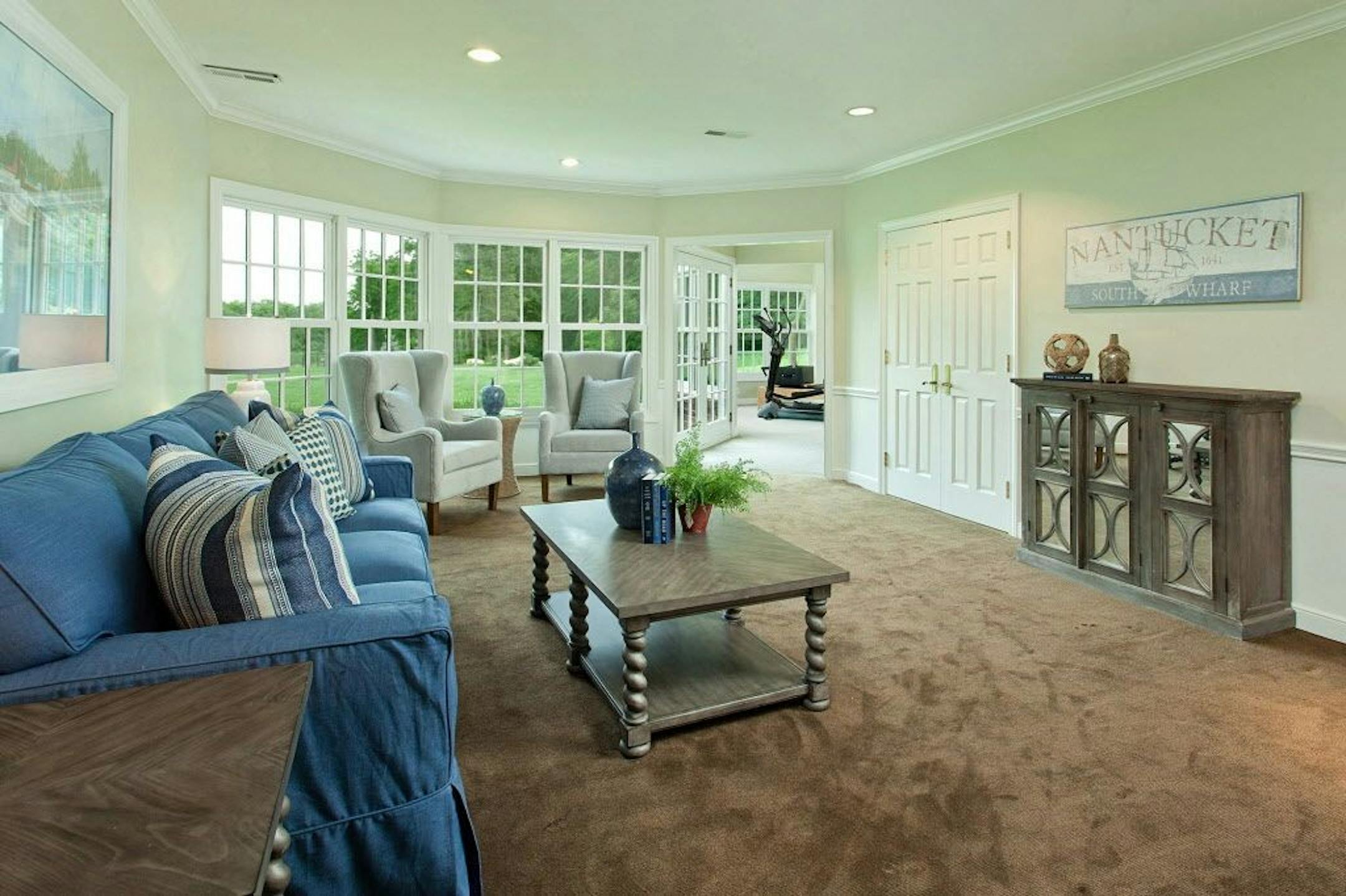 Lower level family room/playroom and exercise room.