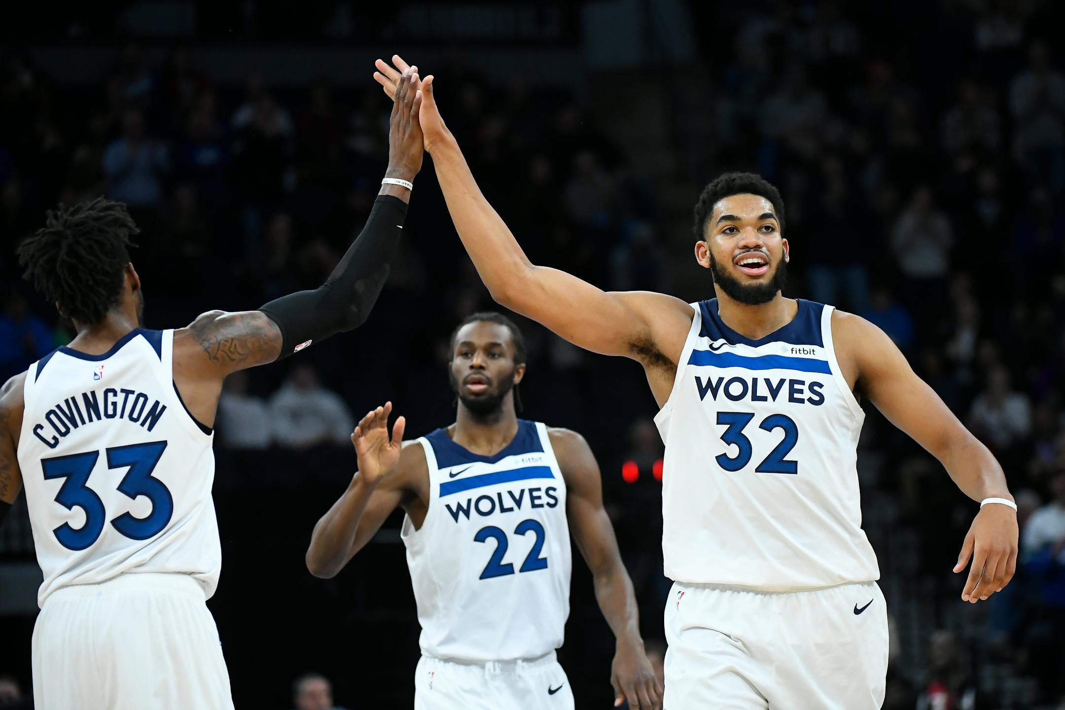 Timberwolves forward Robert Covington, forward Andrew Wiggins and center Karl-Anthony Towns reacted after a fourth quarter timeout called by the Hornets during Wednesday's Wolves victory.