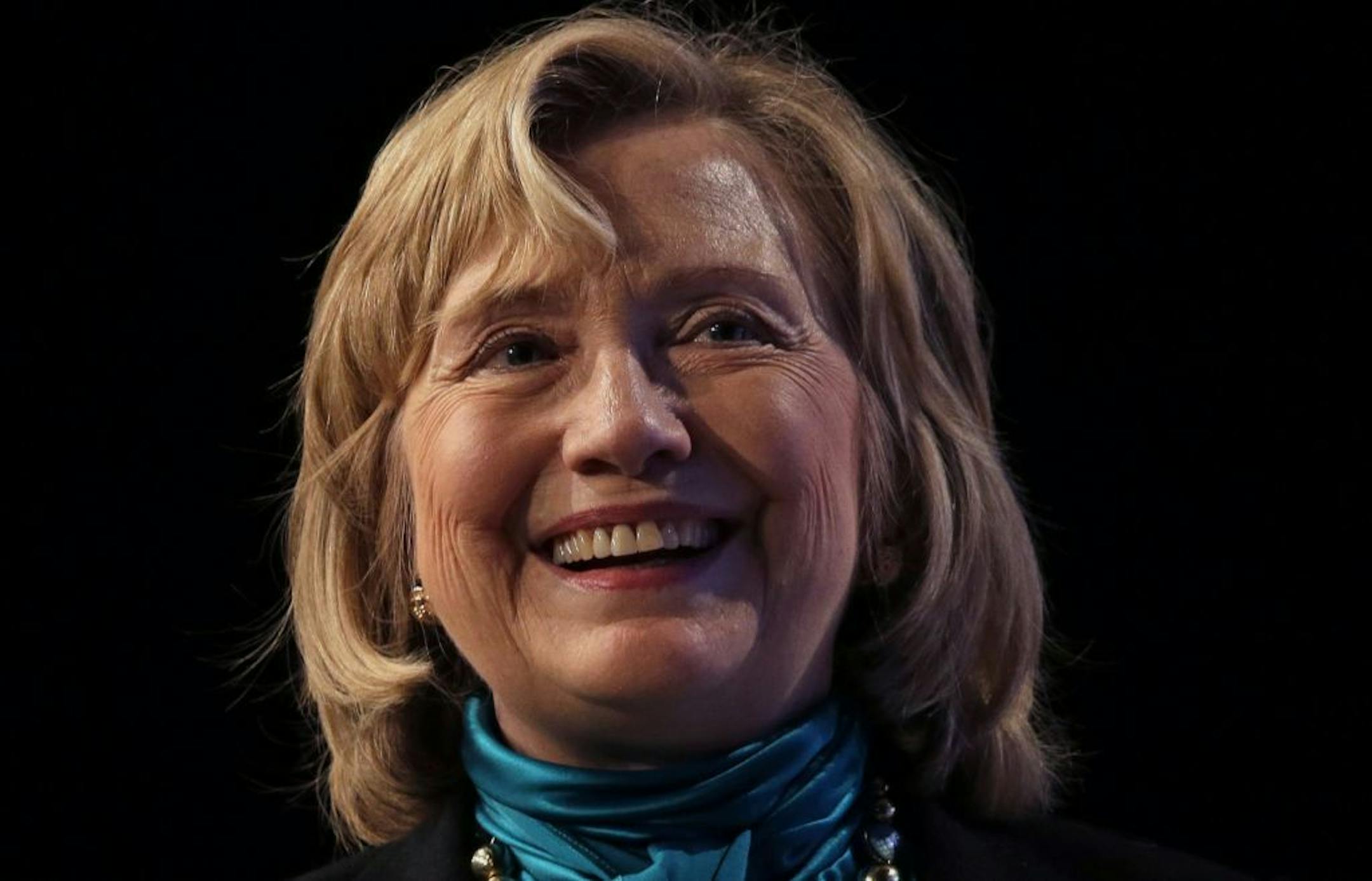 FILE - In this Jan. 27, 2014, file photo, former Secretary of State Hillary Rodham Clinton speaks in New Orleans. Clinton is helping initiate a public service campaign encouraging Hispanic families to read, sing and talk more to their young children so they�re better prepared for school.