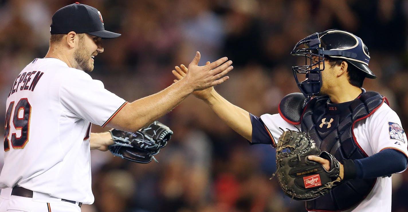 Twins relief pitcher Kevin Jepsen celebrated a victory with catcher Kurt Suzuki.