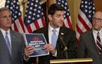 FILE -- House Speaker Paul Ryan, center, speaks at a news conference regarding the American Health Care Act, on Capitol Hill in Washington, March 7, 2