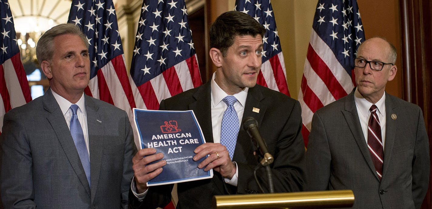 FILE -- House Speaker Paul Ryan, center, speaks at a news conference regarding the American Health Care Act, on Capitol Hill in Washington, March 7, 2017. The House Republican plan to repeal and replace the Affordable Care Act would cause 24 million people to lose health insurance within a decade, the nonpartisan Congressional Budget Office said on March 13. From left: Rep Kevin McCarthy (R-Calif.), Ryan and Rep. Greg Walden (R-Ore.). (Gabriella Demczuk/The New York Times) ORG XMIT: MIN201703221