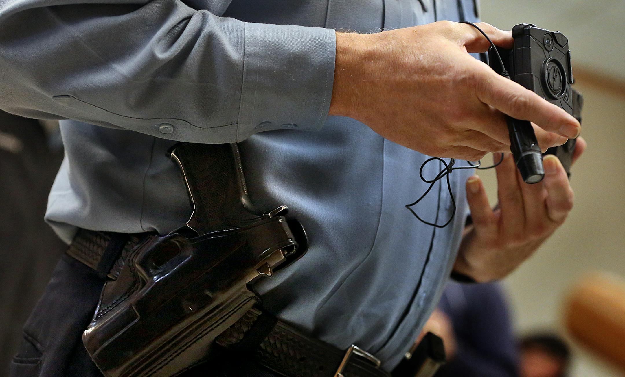 Minneapolis Police Lt. Greg Reinhardt displayed a body camera.