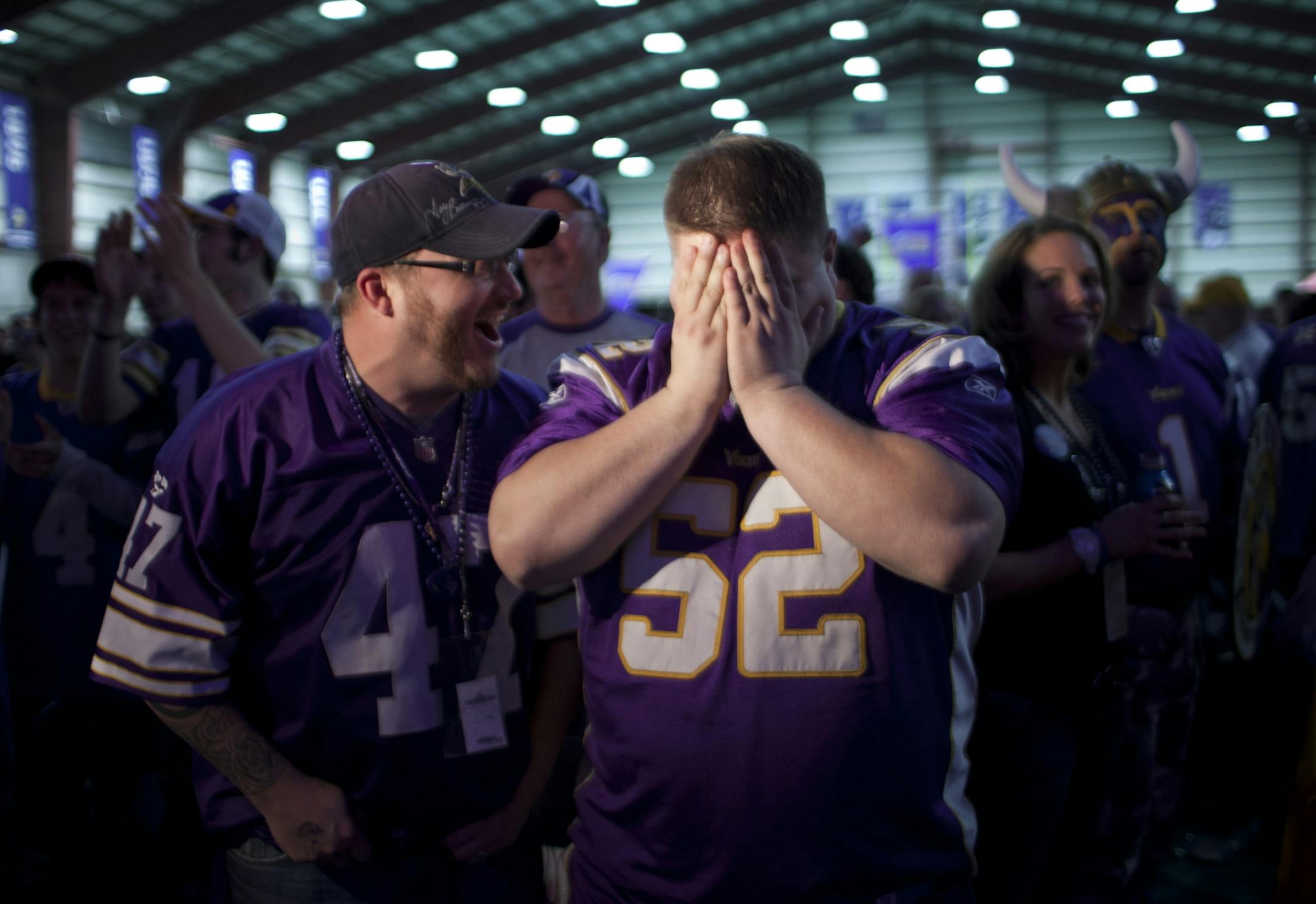 Brandon Young was not pleased when the Minnesota Vikings first round pick of quarterback Christian Ponder was announced. His buddy Jim Vnuk laughed at left, in the front row of the 2011 draft party in the field house at Winter Park.